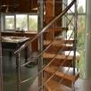 Винтовая лестница в интерьере жилого дома